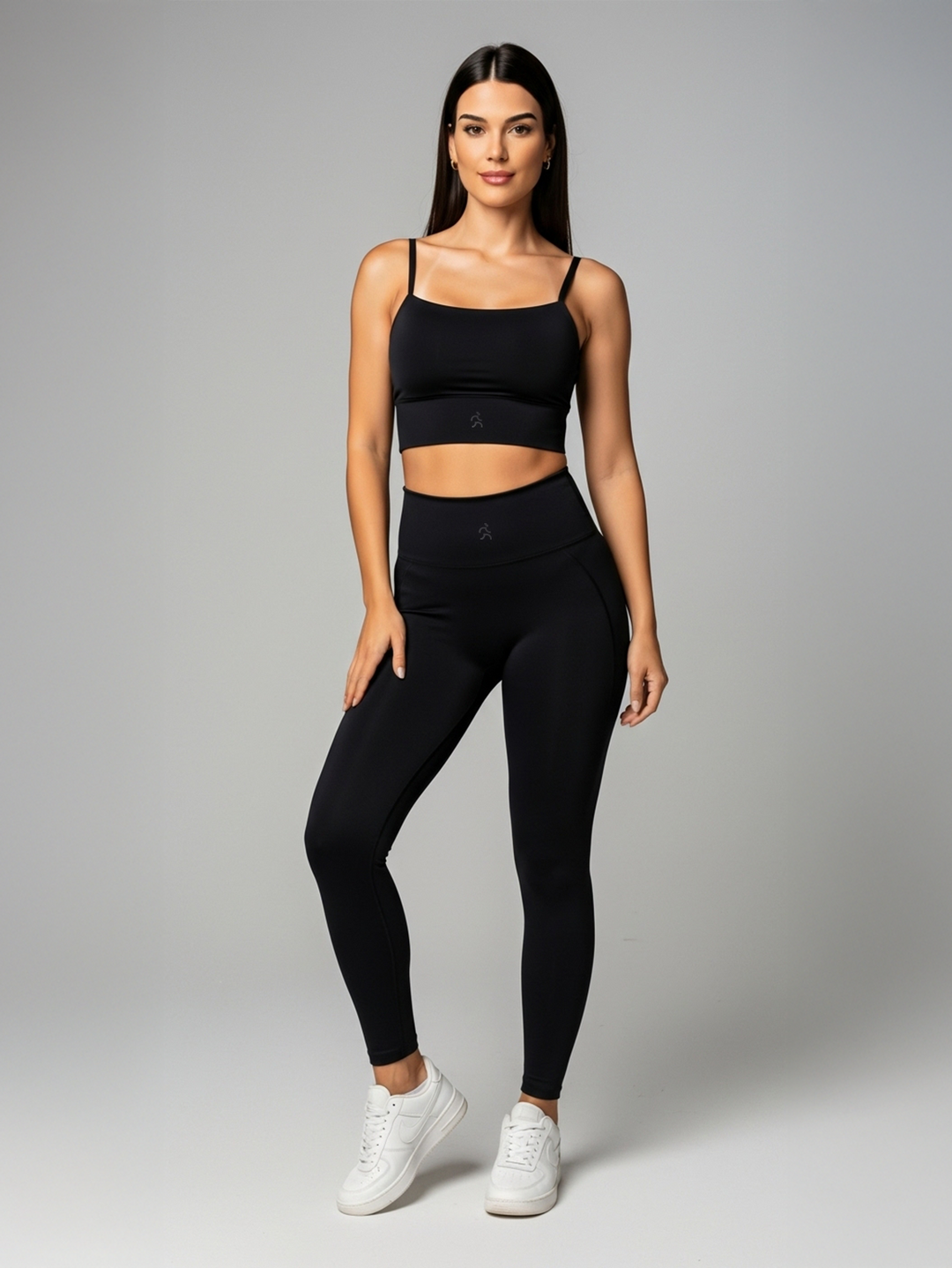 Legging Powershape preta vista frontal com modelagem corporal e proteção UV50+